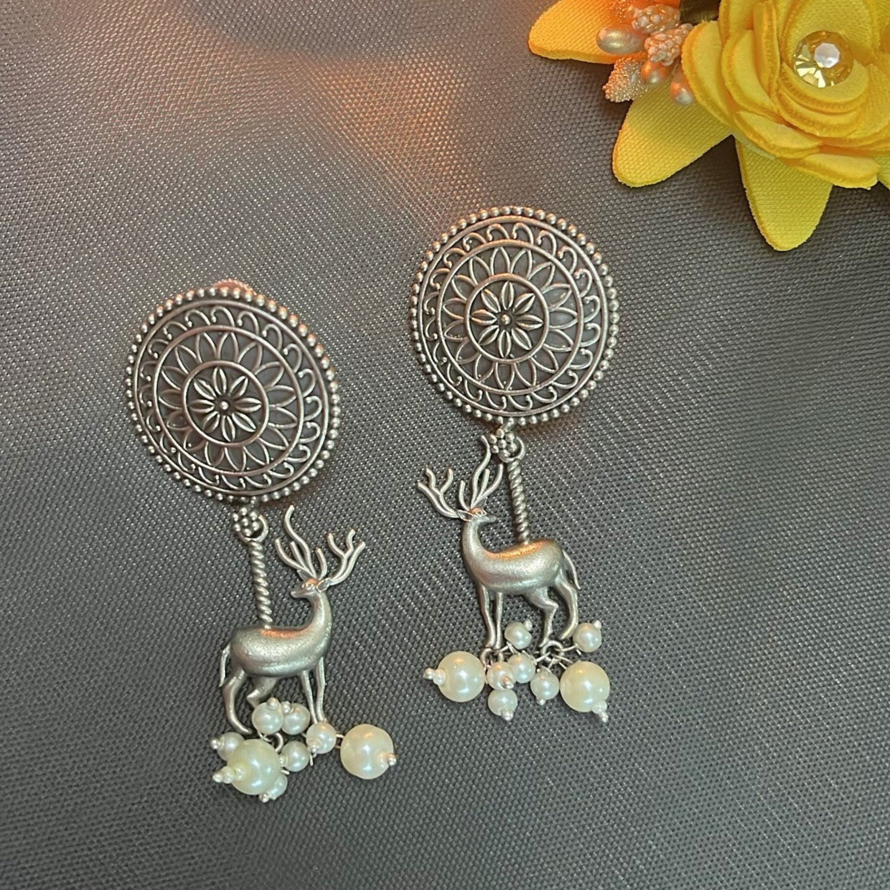 German Silver Plated Long Reindeer Earrings