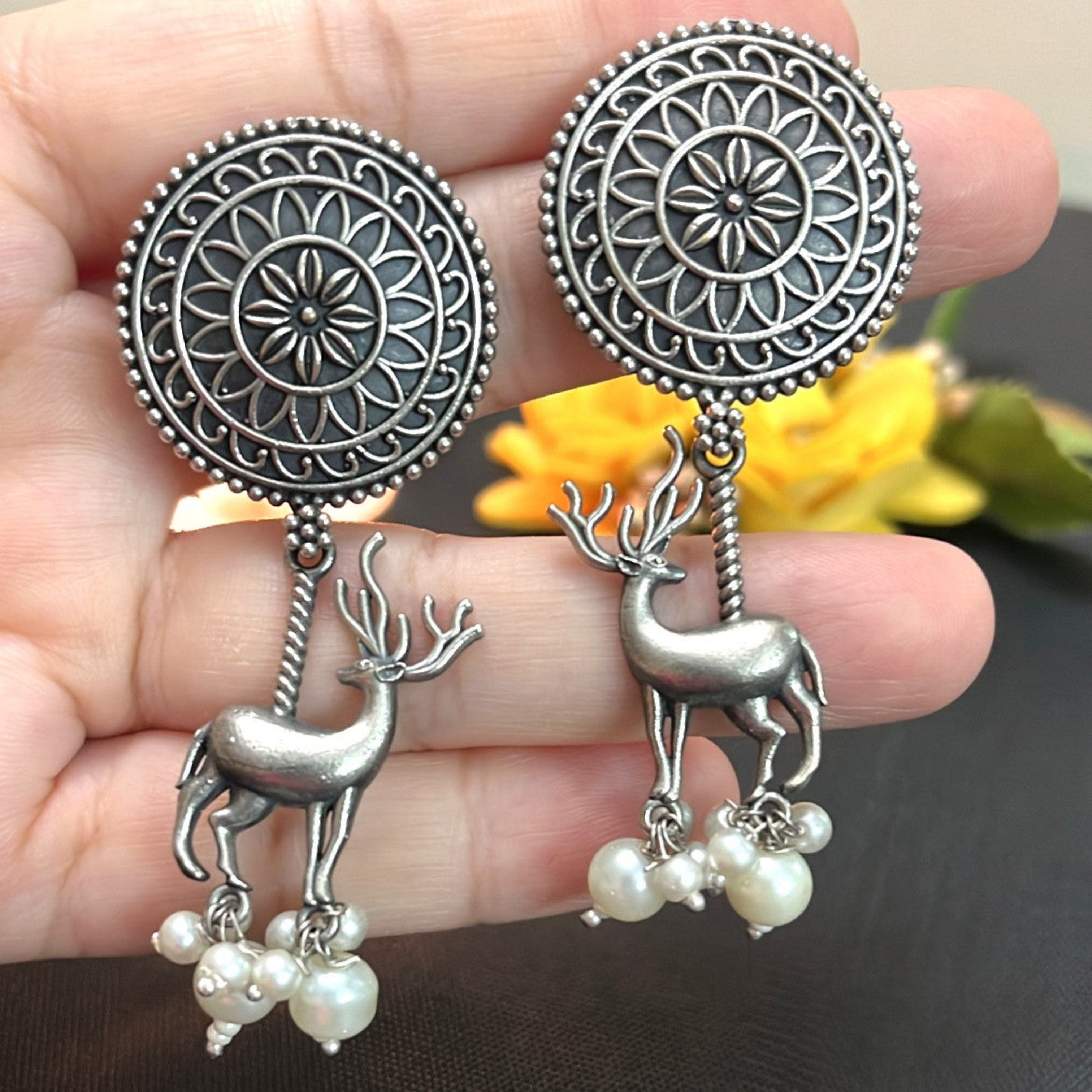 German Silver Plated Long Reindeer Earrings