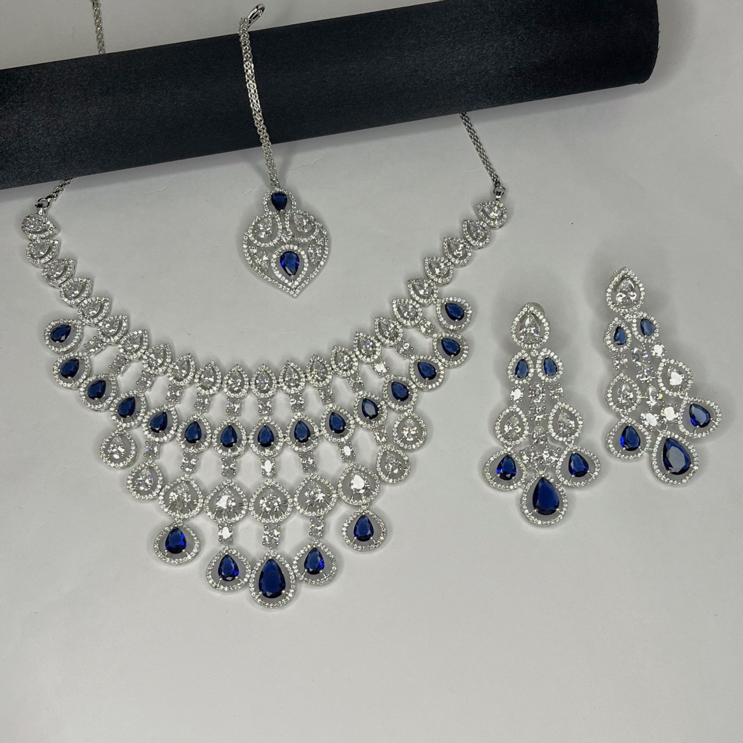 Petal Design Blue & White Crystal AD Studded Necklace Set with Maang Tikka