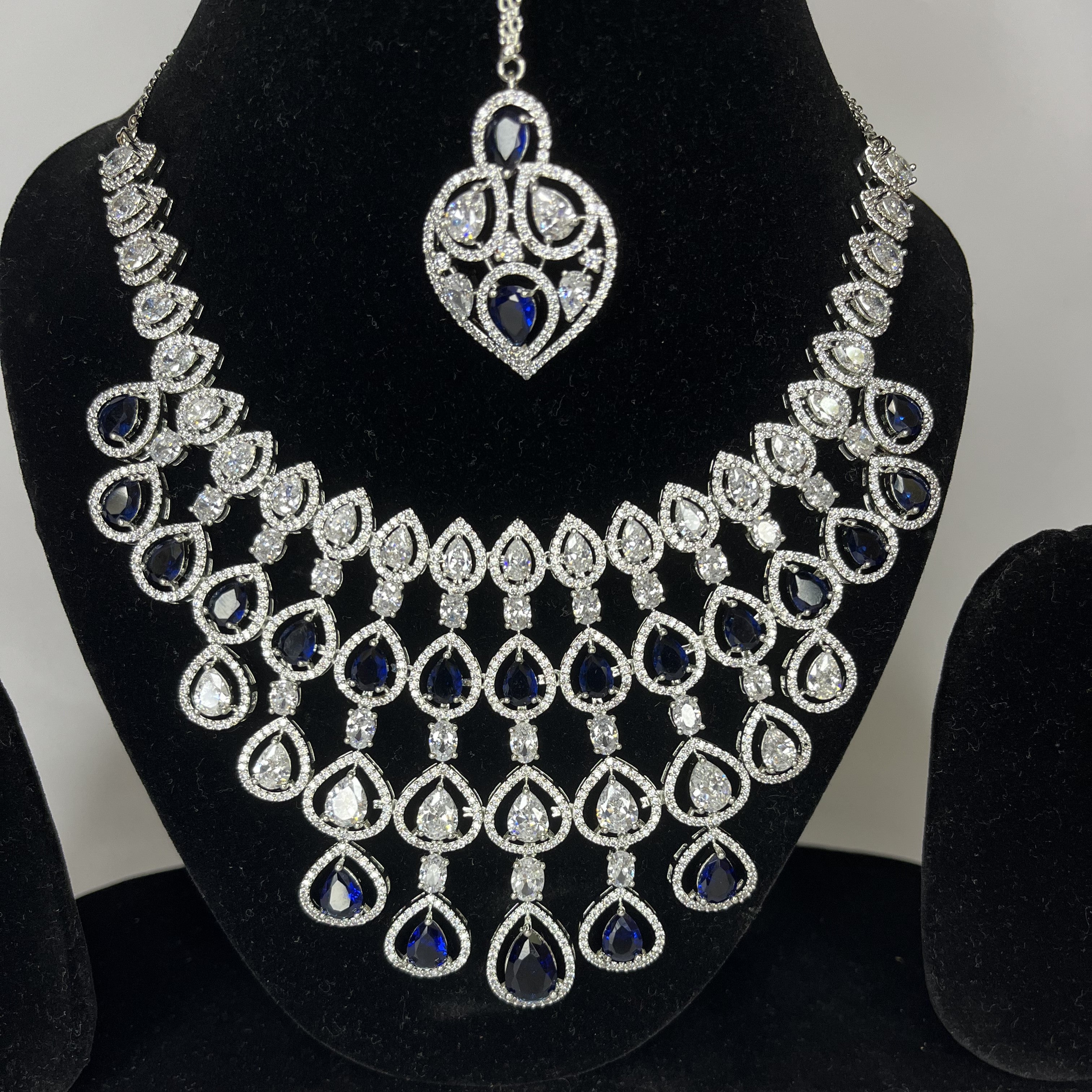 Petal Design Blue & White Crystal AD Studded Necklace Set with Maang Tikka