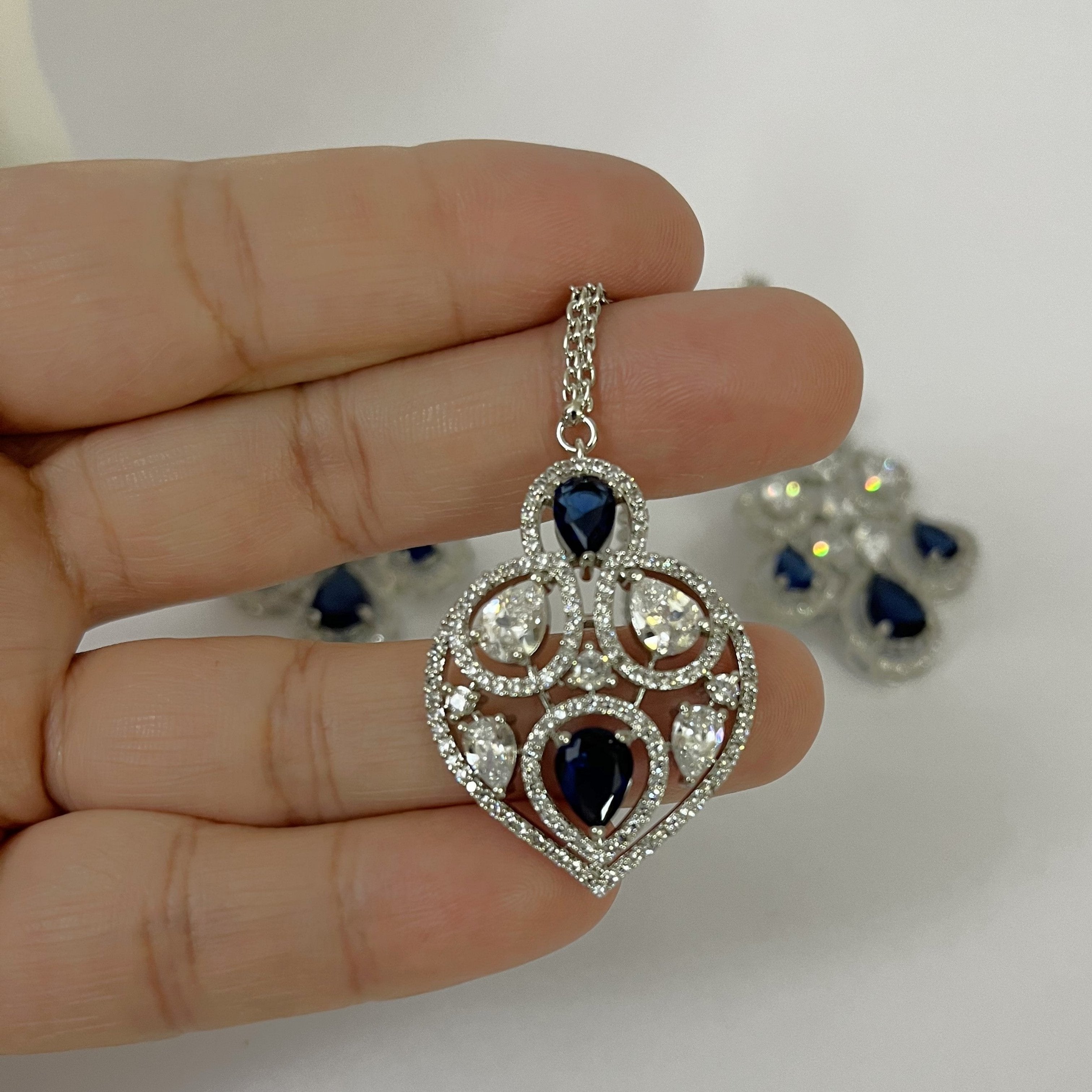 Petal Design Blue & White Crystal AD Studded Necklace Set with Maang Tikka